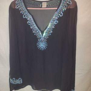 Pow Wow size 12 black with teal embroidering